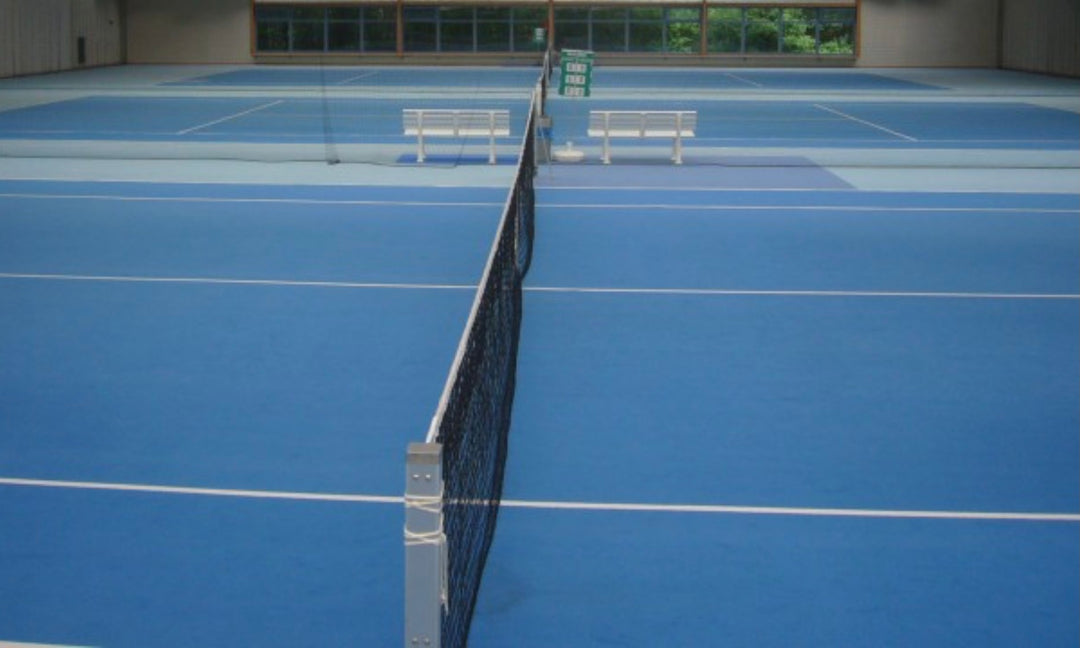 Pflege von Tennishallenplätzen